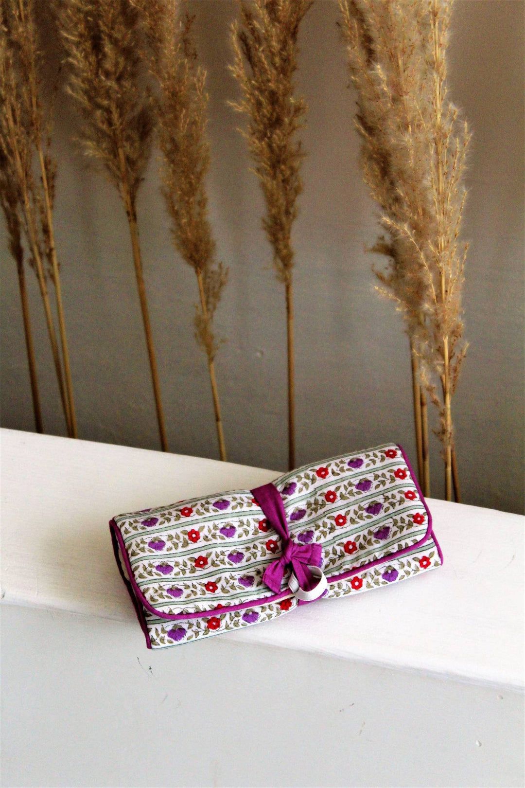 Floral stipe accessory pouch